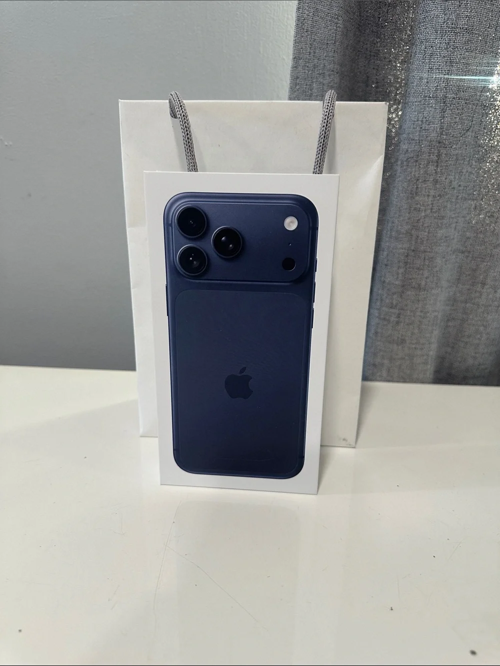 Authentic empty Apple iPhone 17Pro Max - Midnight Blue Finish box and bag.
